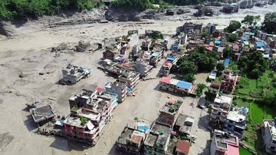 Nepal floods: Terrifying videos show homes, buildings and bridges swallowed by raging waters