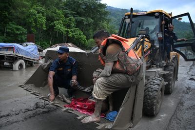 Nepal Flash Flood Kills at Least 95 and Leaves Hundreds Missing as Wrecked Roads Slow Medical Rescue