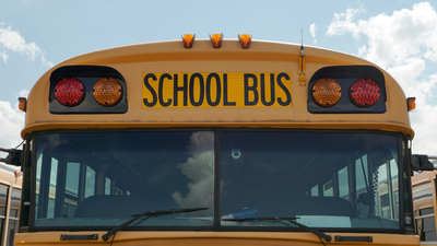 ‘Let me have my kid’: California parents storm school bus after driver refuses to release children for an hour