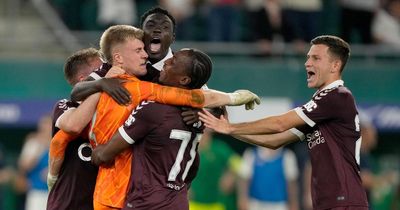 Rapid Vienna 2-2 Hearts: Heroic ten-man Hearts qualify for league phase via penalties