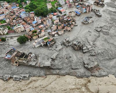 Nearly 1,400 missing, mostly tourists, after Nepal-Tibet flash flood kills at least 356
