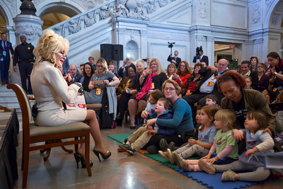 Republicans Quietly Cut Dolly Parton's Reading Programme Months Before Trump Lowered Flags in Her Honour