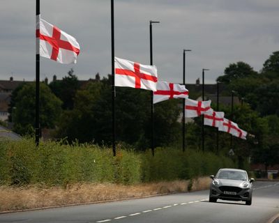 Birmingham seeks injunction to stop anti-migrant group erecting flags on infrastructure