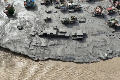 Terrifying CCTV shows people fleeing seconds before floodwaters engulf Nepal-Tibet border crossing