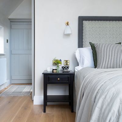 This flooring trick immediately makes a small bedroom look bigger, according to interior designers – 'it creates the illusion of space'