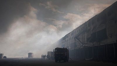 Russian drone strikes hit Ukraine as warehouses burn