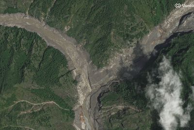 New satellite images show China-Nepal border crossing completely wiped out in flash floods