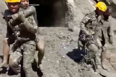 Nepal rescuers race to reach 100 trapped in hydropower tunnel after flash floods