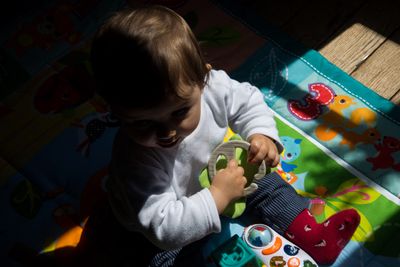 HABA Recalls About 2,000 Rainbow Rattle Teething Toys After the Glued Knot on the Elastic Cord Came Untied