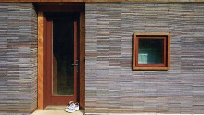 In 2002, Alabama architecture students stacked 72,000 worn carpet tiles into the walls of a family home; Rural Studio has now built more than 200 projects