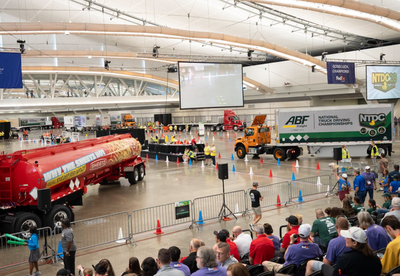 At the 'Super Bowl of trucking,' a driver who trained 14 years wins the golden belt buckle