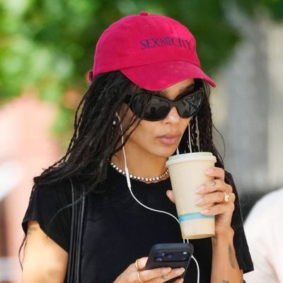Forget Heeled Flip-Flops—Zoë Kravitz Is Ending Summer in Rubber Slides and Adidas Shorts