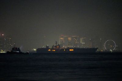 USS Abraham Lincoln sails past Singapore on its way home from Middle East