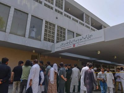 Pakistan suspends eight officials after deadly infant ward fire