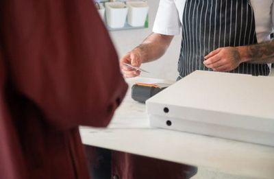 The Checkout Screen Asks for 20% — But Should You Tip on Takeout?