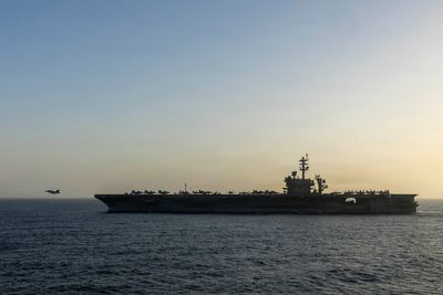 US hits Iranian rocket launchers off the Strait of Hormuz in first new attack in weeks