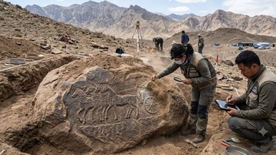China discovers a rare four-horse chariot carved into a buried rock; fewer than 20 chariot scenes were known in the Helan Mountains