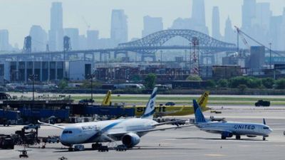 13 injured as shuttle bus crashes into barrier at Newark Airport