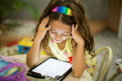 As Latino Parents Struggle With Kids' Screen Time, Tech Companies Are Building New Digital Guardrails