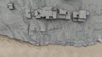 There’s power in a simple camera angle. From Dolly Parton to natural disasters, the best news photos this week highlight the power of composition