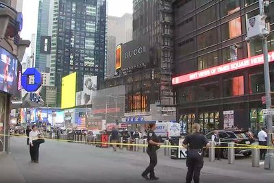 Woman shot dead by police in Times Square after fatally stabbing one and injuring another