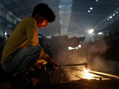 India's factory growth at five-year low in August on weakening demand, PMI shows