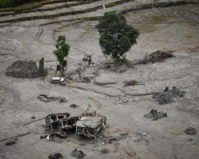 Nepal-Tibet flood deaths pass 1,000 as police ask relatives for DNA to identify victims