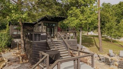 More than 40 Tennessee tiny-home owners are seeking $5 million in a 'zombie HOA' lawsuit, alleging nearly 80% of the HOA budget went to a lawn care company owned by the developer