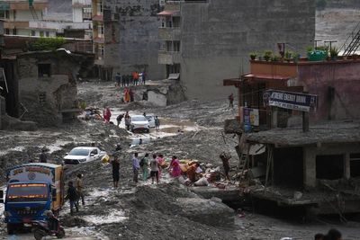 British volunteer aid worker says he was mistaken for floods survivor