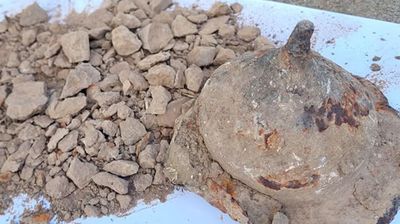 Man rummaging in a Polish junkyard finds a 1,800-year-old shield holding the cremated remains of a Vandal warrior