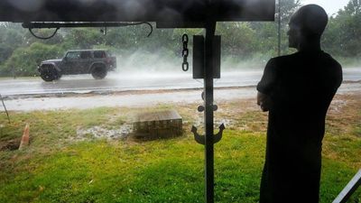 Tropical depression Edouard brings floods to Texas; knocks out power for thousands