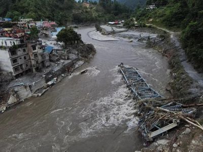 When roads end, drones carry dead home in flood-hit Nepal