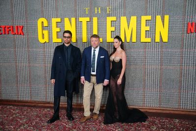 The Gentlemen star Theo James gives verdict on Meghan joining show as stars come out for London premiere