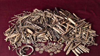 Homeowner discovers 18.5 kg Viking silver hoard in Denmark after garden fork strikes buried treasure while digging for a new terrace