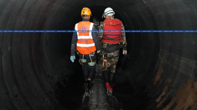 Flood-swept vehicle plugs tunnel mouth, saves 40 workers