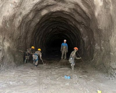 Dozens of trapped hydropower tunnel workers in Nepal could still be alive, official says