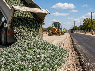 In 1997, Abilene collected 240 tons of waste glass for Antilley Road; Dyess Air Force Base crushed the glass at $9 a ton for two 750-foot test sections