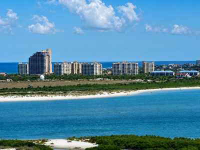 In 2016, New Smyrna Beach faced Hurricane Matthew with planted living shorelines; winds topped 90 mph, yet the demonstration structures remained standing