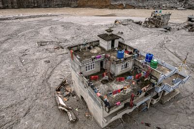Rescuers in Nepal pull a Chinese national alive from a hydropower tunnel 10 days after floods
