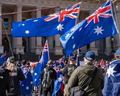Coalition denies flag-burning ban an attempt to undercut One Nation as Labor says push has ‘element of desperation’