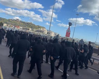 Black-clad Dover vigilantes will return if police do not act, say campaigners