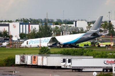 Five dead after Amazon cargo plane overshoots runway and crashes during landing at Miami airport
