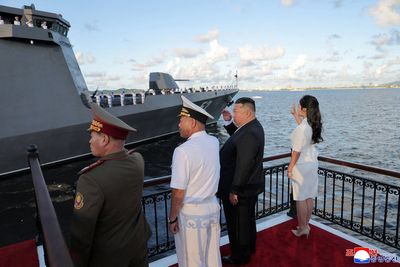 Kim Jong Un suggests new naval destroyer will be armed with nuclear weapons during grand unveiling