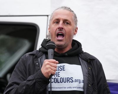 Leader of group behind flag campaign in England charged with 14 offences