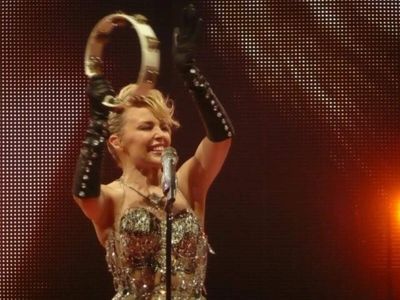 Quote of the Day by Kylie Minogue: 'If someone feels they have to live up to a certain image...'- Inspiring life lessons on authenticity, self-image, and letting go of unreal expectations by the Grammy-winning "Princess of Pop"