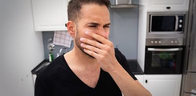 Why does microwaving fish smell so bad?