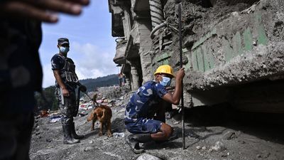 Nepal rescuers race to free dozens trapped in hydropower tunnels