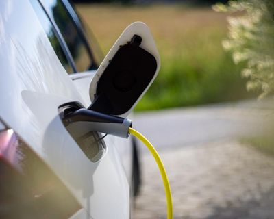 Electric car owners could save hundreds of dollars a year under the solar sharer scheme. Here’s how