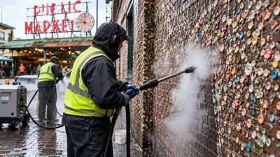 Seattle Gum Wall Reset: workers use steam to strip a tonne of gum; tradition quickly returns