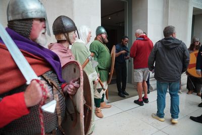 Swords and shields at the ready: Bayeux Tapestry attracts crowds at British Museum after historic UK return